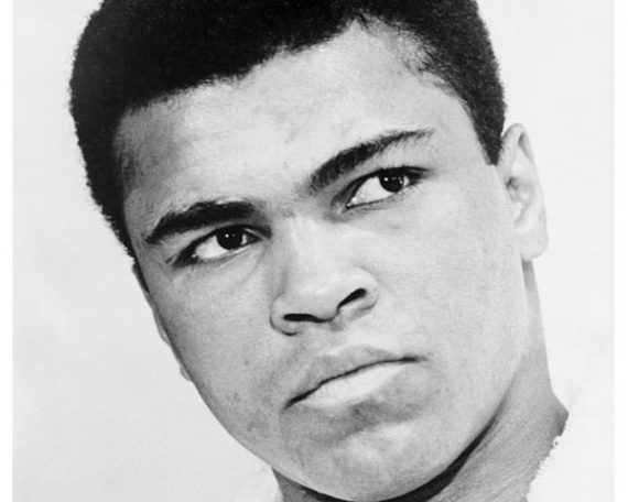 A black and white photo of Muhammad Ali